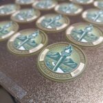 Composite design using a multicolor PLA 3d print for border elements and a dye sublimation photo for the dense center elements. Designed for the 11th Battlaion, Army Reserve Careers Group